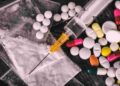 02 Notorious Drug Peddlers Booked Under PSA in Budgam: Police